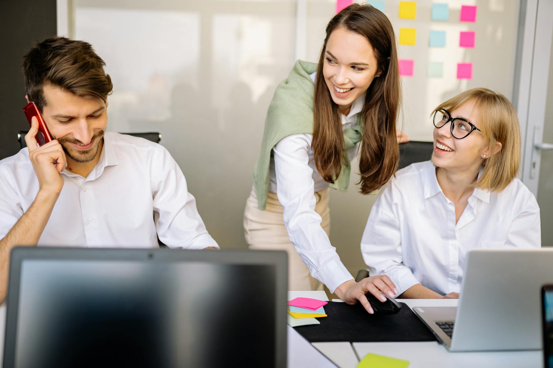 happy colleagues working together